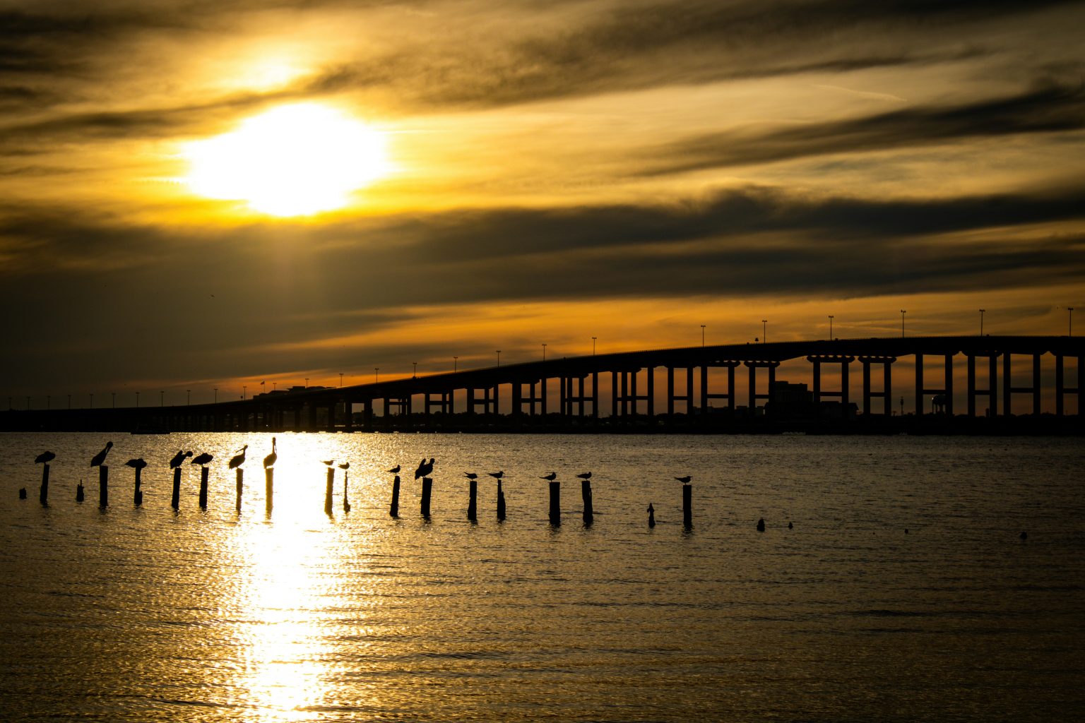 Ocean Springs bridge at sunset over the Louisiana Sound